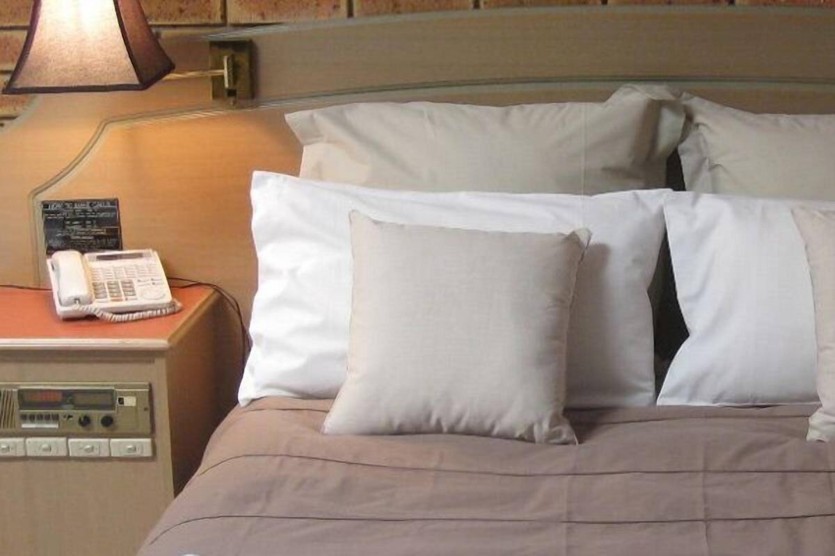 Down duvets, desk, blackout curtains, iron/ironing board