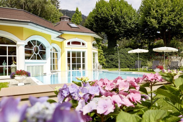 Indoor pool, outdoor pool, open 7:30 AM to 8 PM, pool umbrellas