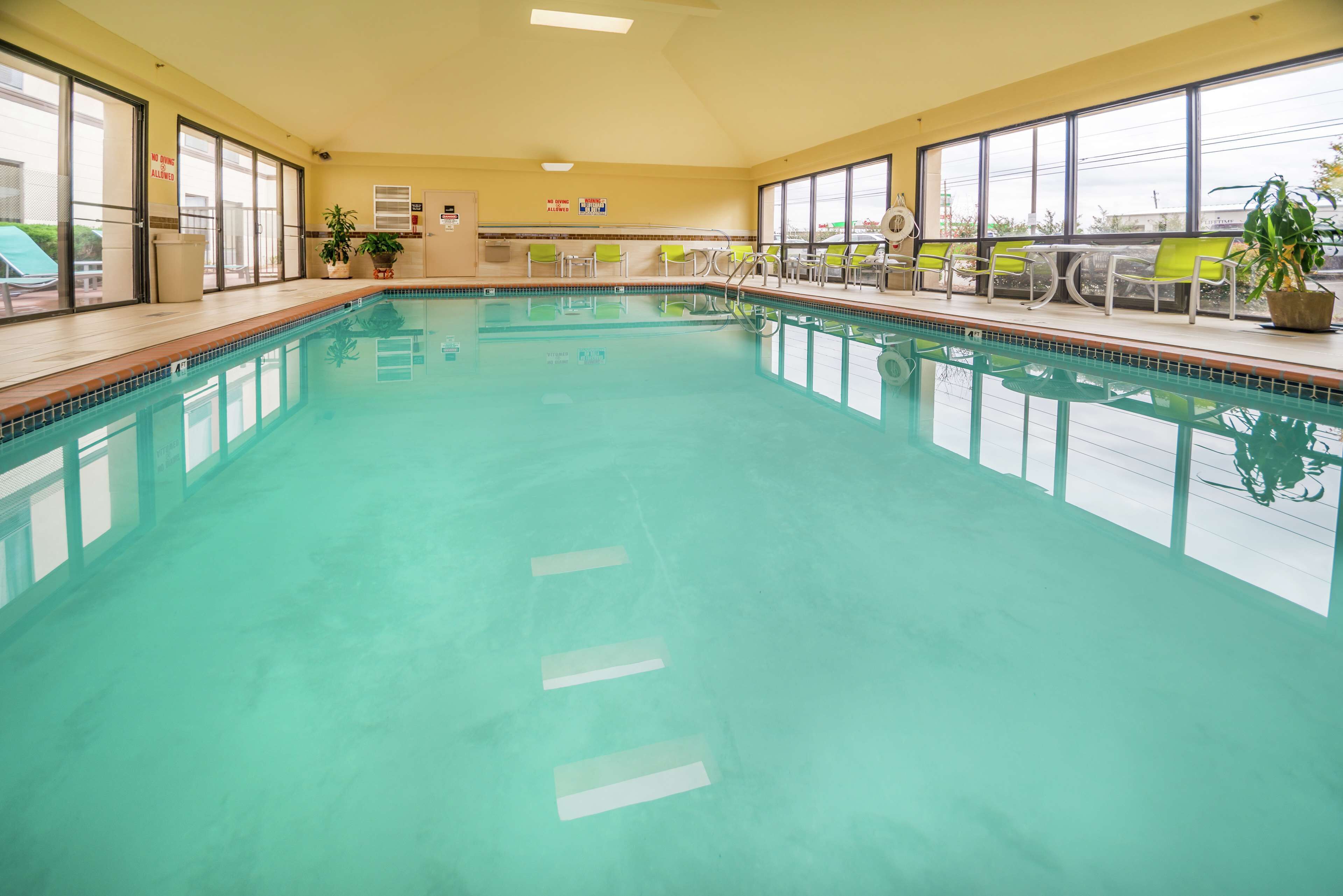 Indoor pool, open 9:00 AM to 10:00 AM, sun loungers