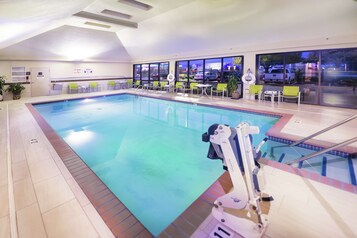 Indoor pool, open 9:00 AM to 10:00 AM, pool loungers