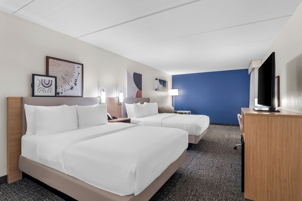Edredón, camas Select Comfort y caja de seguridad en la habitación 