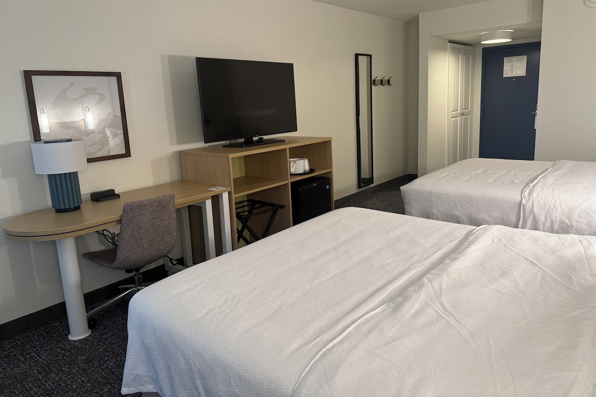 Down duvets, Select Comfort beds, in-room safe, laptop workspace