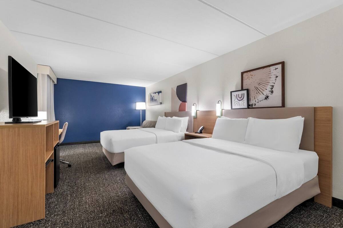 Down comforters, Select Comfort beds, in-room safe, laptop workspace