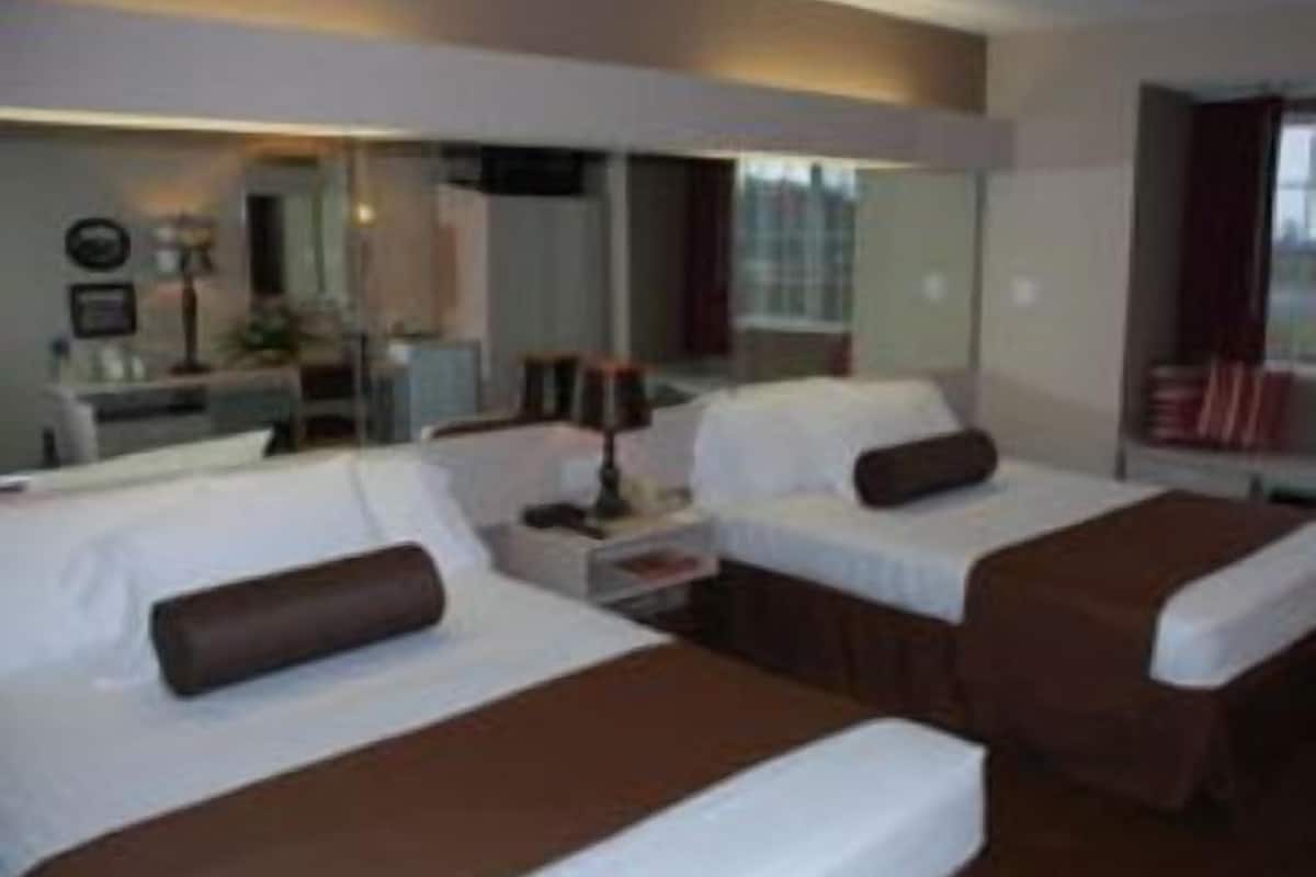 Double Room, 2 Queen Beds, Refrigerator & Microwave | In-room safe, desk, iron/ironing board, free WiFi