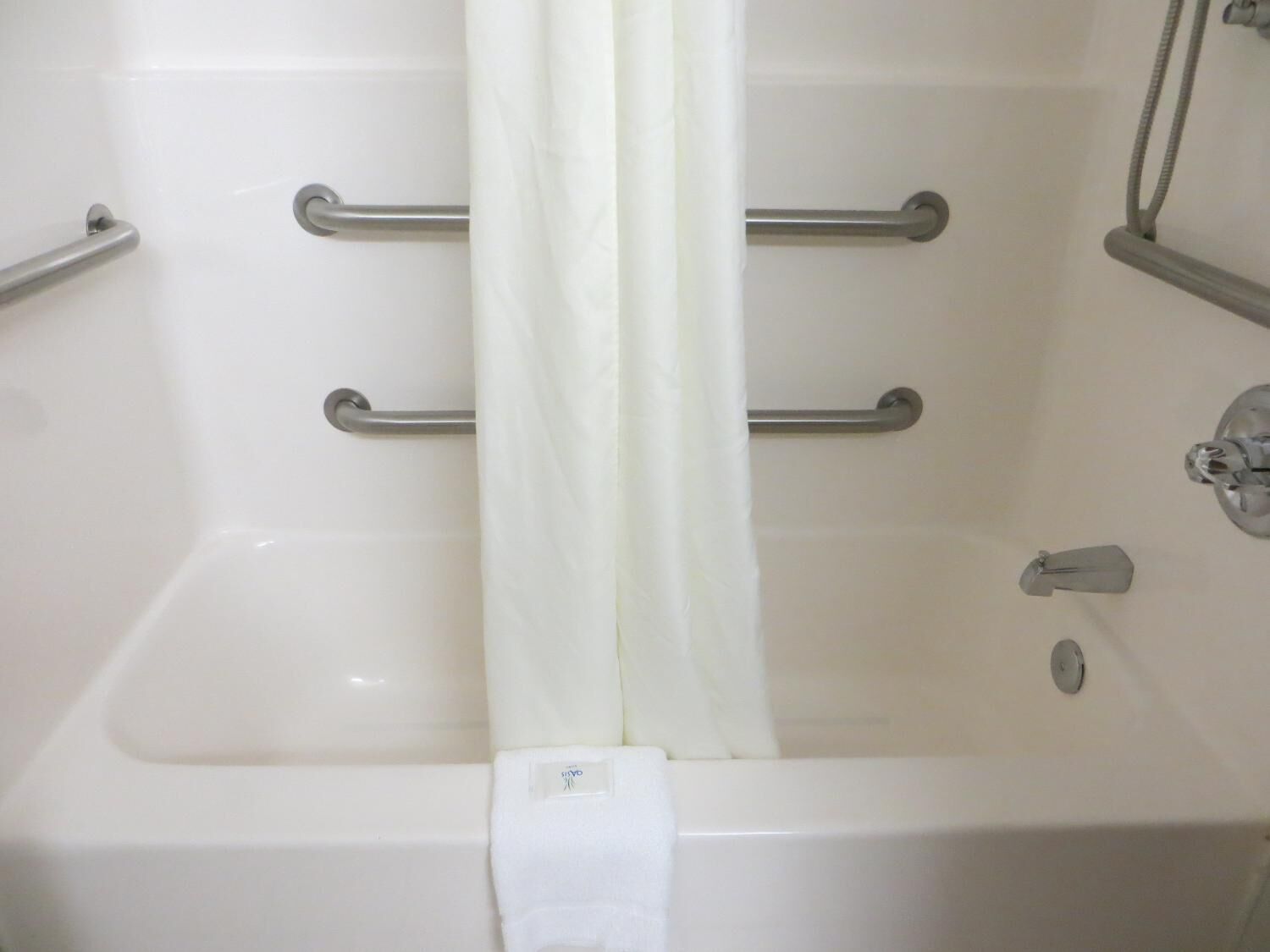 combined shower/bathtub, free toiletries, hair dryer, towels