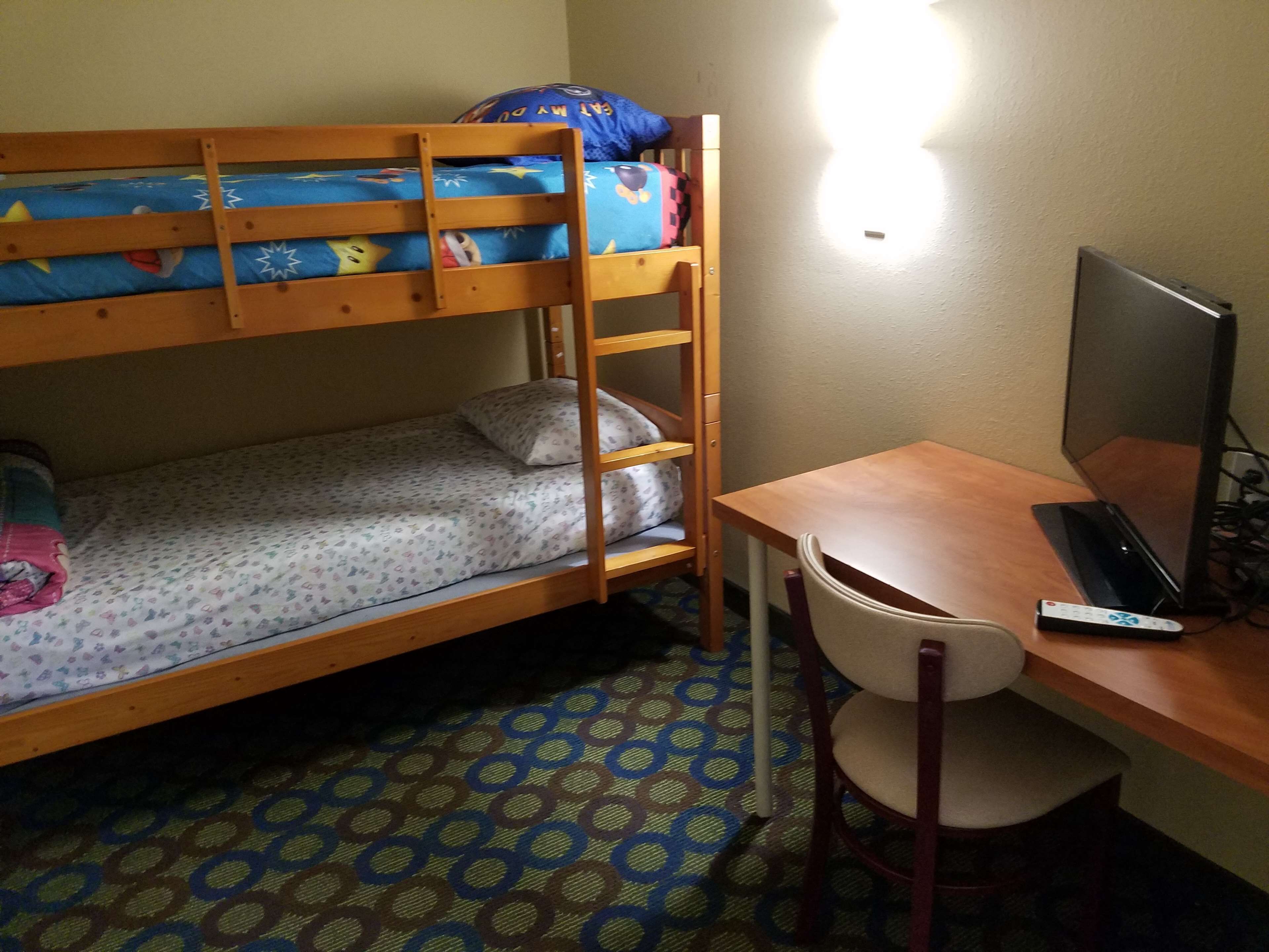 suite, 2 queen beds, non smoking, jetted tub (bunk beds) | desk, iron/ironing board, free wifi, bed sheets