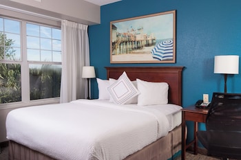 Hotel amenities such as safe, desk and work area at Residence Inn Charleston Riverview