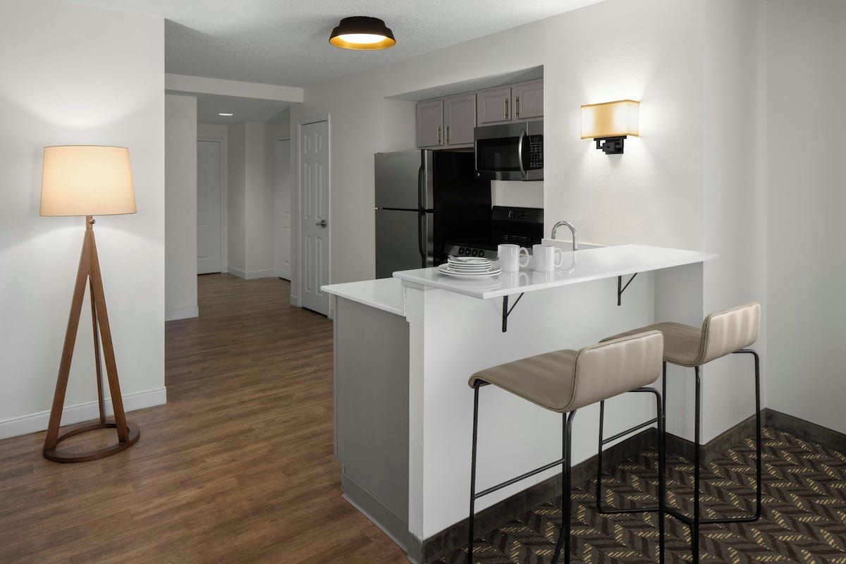 Suite, 1 Bedroom, Corner | Private kitchen | Full-size fridge, microwave, oven, stovetop