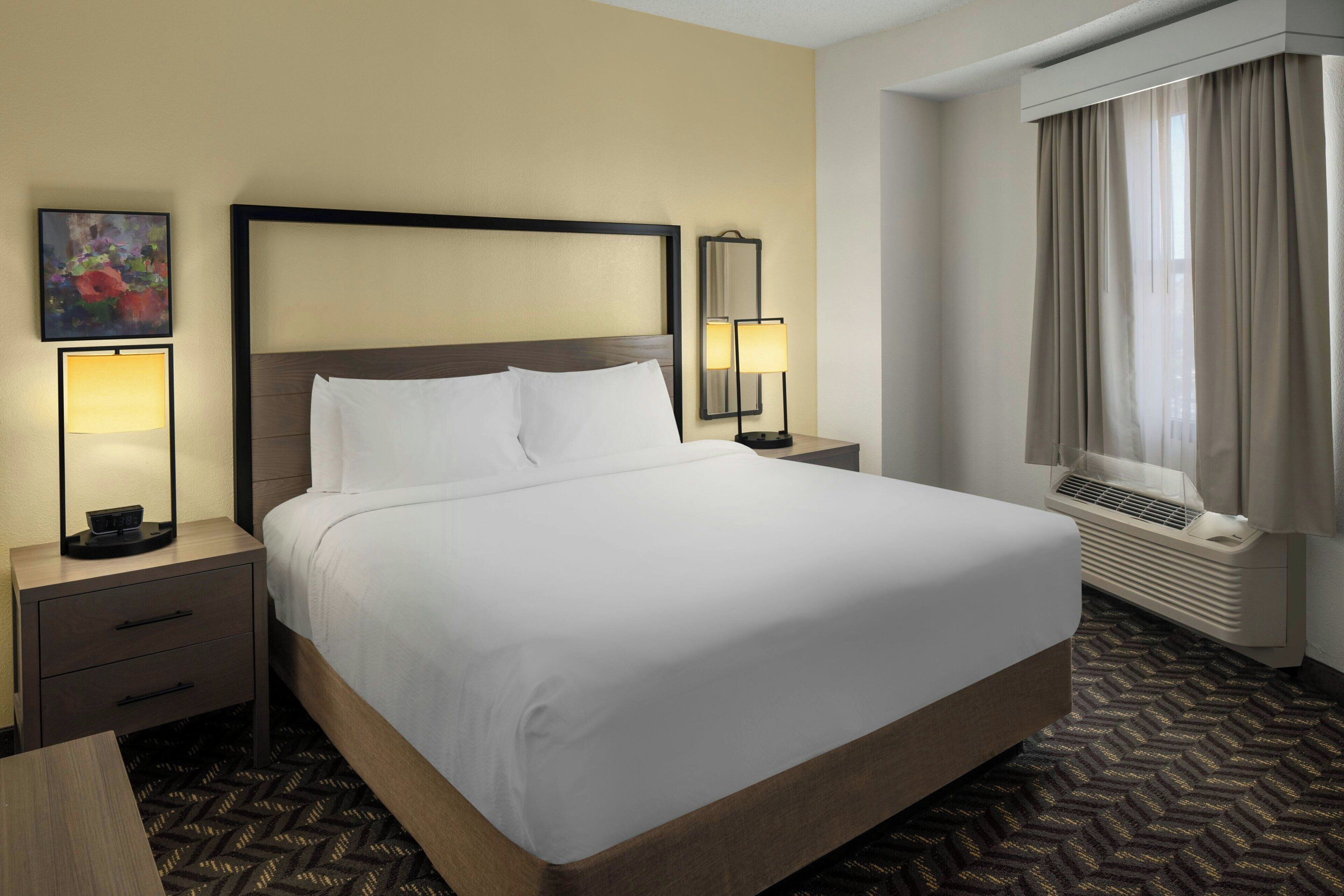 Suite, 1 Bedroom, Corner | Premium bedding, down comforters, individually furnished, desk