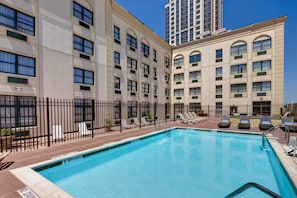 Seasonal outdoor pool, open 9 AM to 7:00 PM, sun loungers
