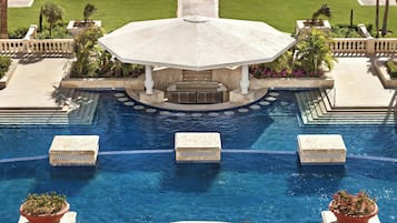 4 outdoor pools, open 7:00 AM to 6:00 PM, pool umbrellas, sun loungers