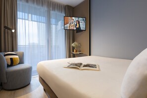 Couette en duvet d'oie, coffres-forts dans les chambres, bureau