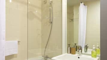 Combined shower/tub, deep soaking tub, free toiletries, hair dryer