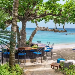 3 bars/lounges, poolside bar, beach bar