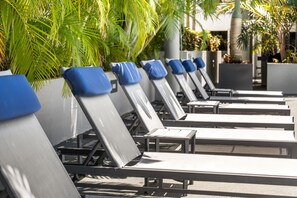 Outdoor pool, open 7:00 AM to 6:00 PM, sun loungers