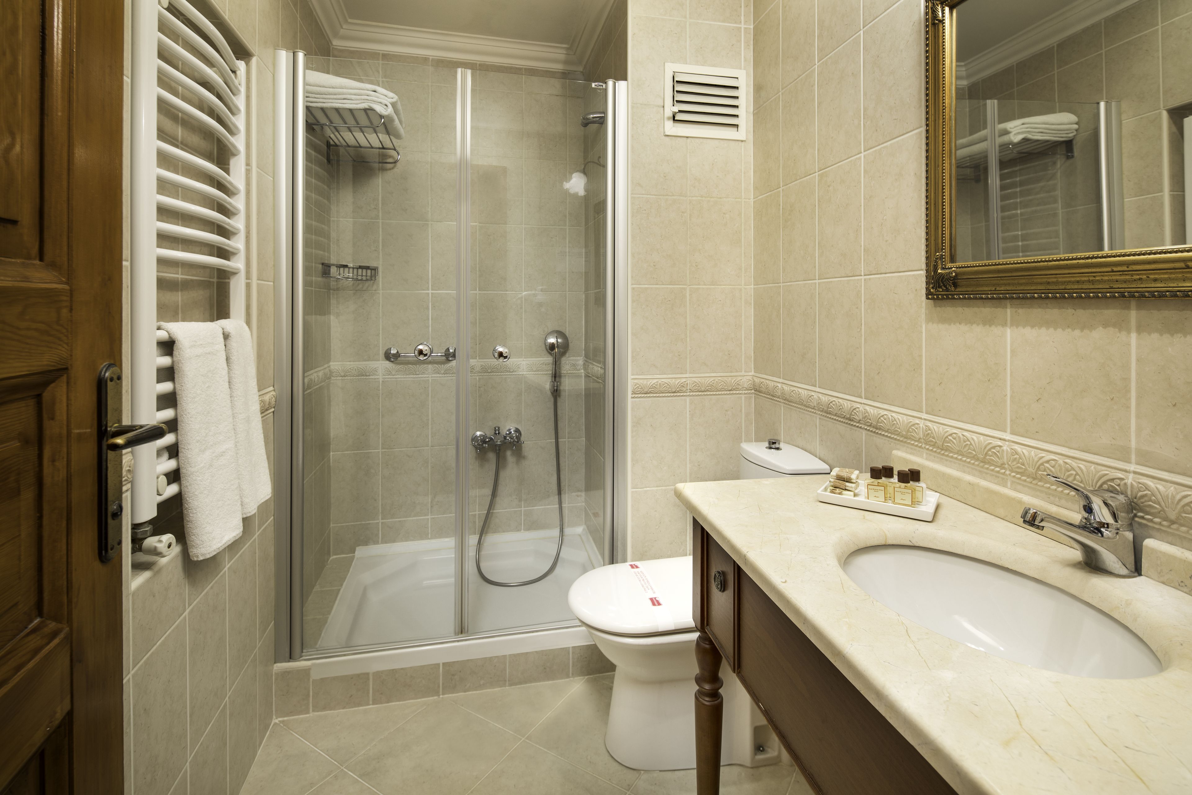 shower, free toiletries, hair dryer, slippers