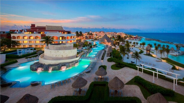 A resort with multiple swimming pools, a beach area, and a view of the ocean. - Hard Rock Hotel Riviera Maya -  All Inclusive (Puerto Aventuras)