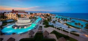 A resort with multiple swimming pools, a beach area, and a view of the ocean. - Hard Rock Hotel Riviera Maya -  All Inclusive (Puerto Aventuras)