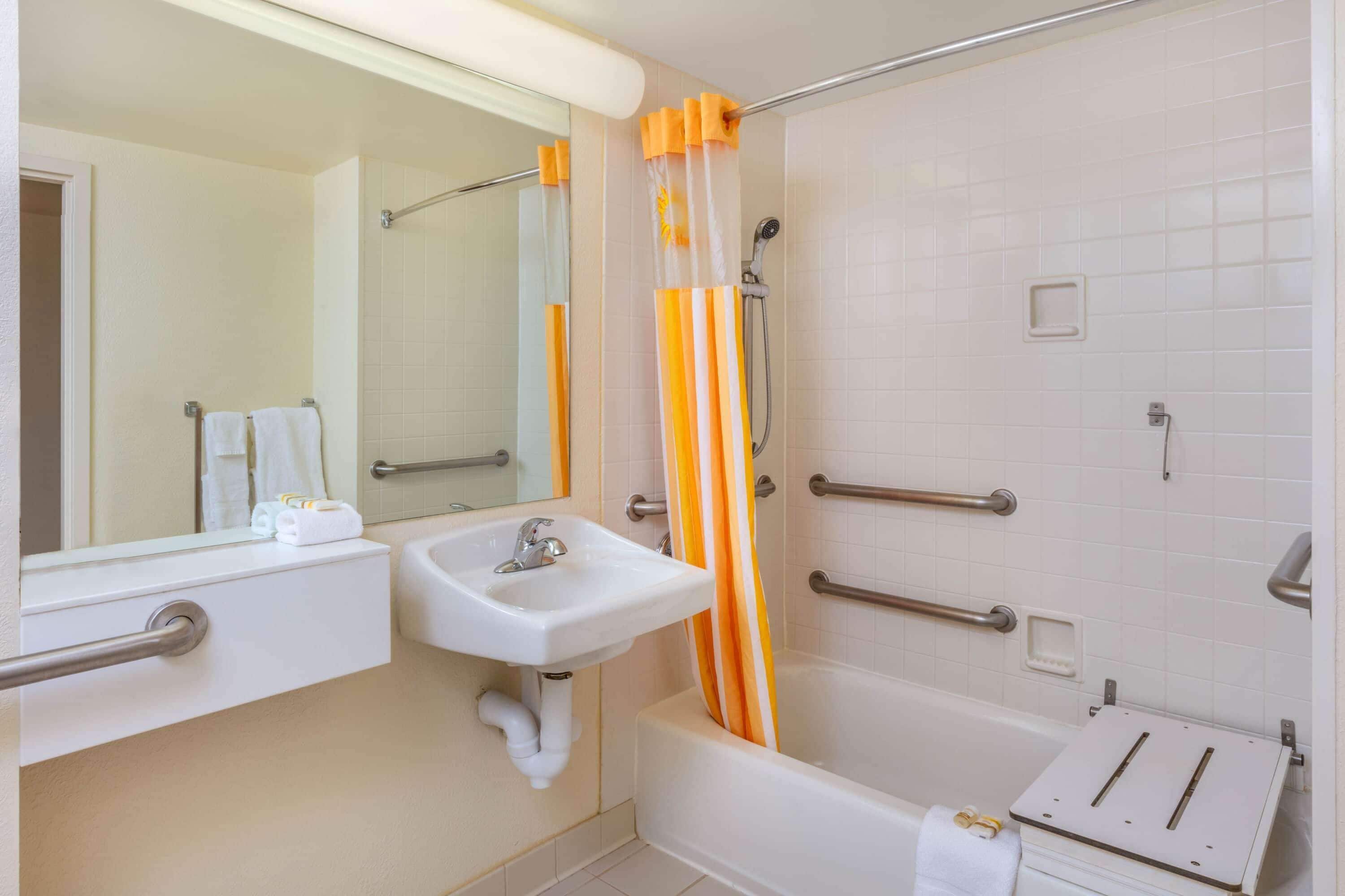 combined shower/bathtub, free toiletries, hair dryer, towels