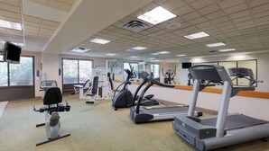 A gym with treadmills, elliptical machines, and a stationary bike. - La Quinta Inn & Suites by Wyndham Garden City (Garden City)
