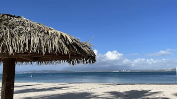 Praia particular, areia branca