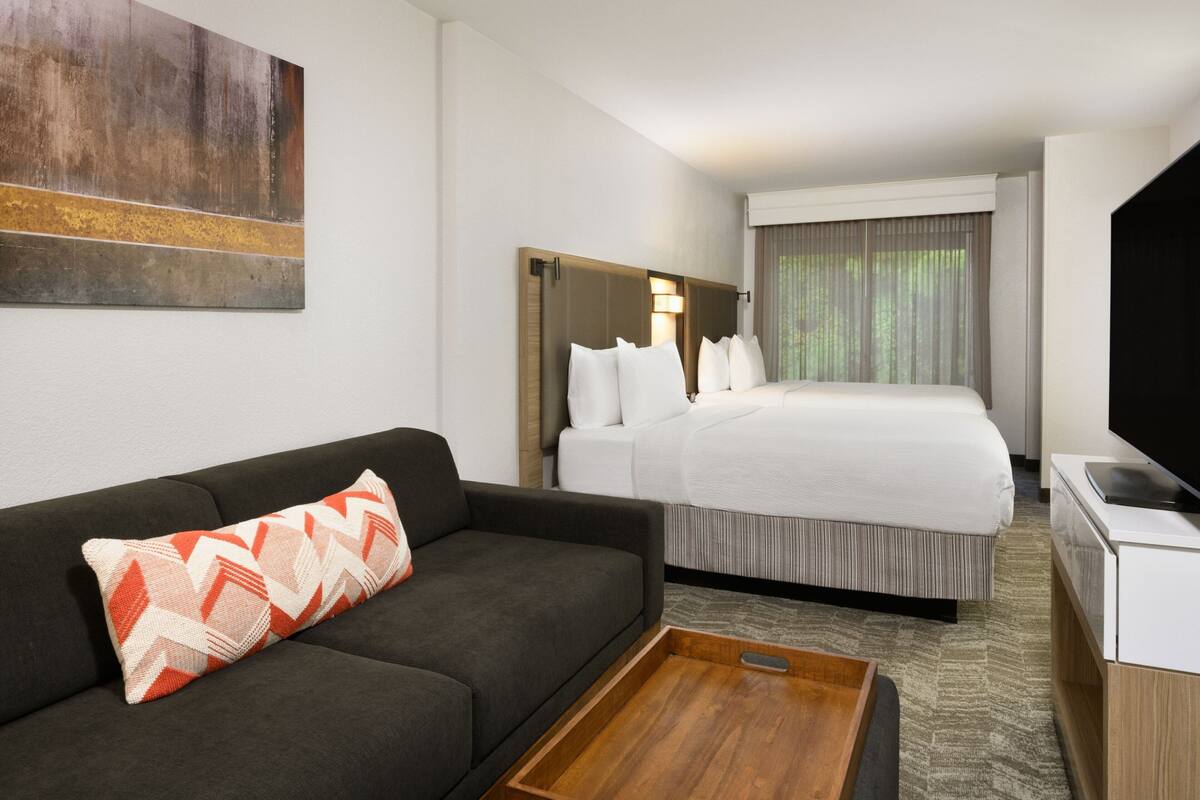 Premium bedding, pillowtop beds, desk, laptop workspace