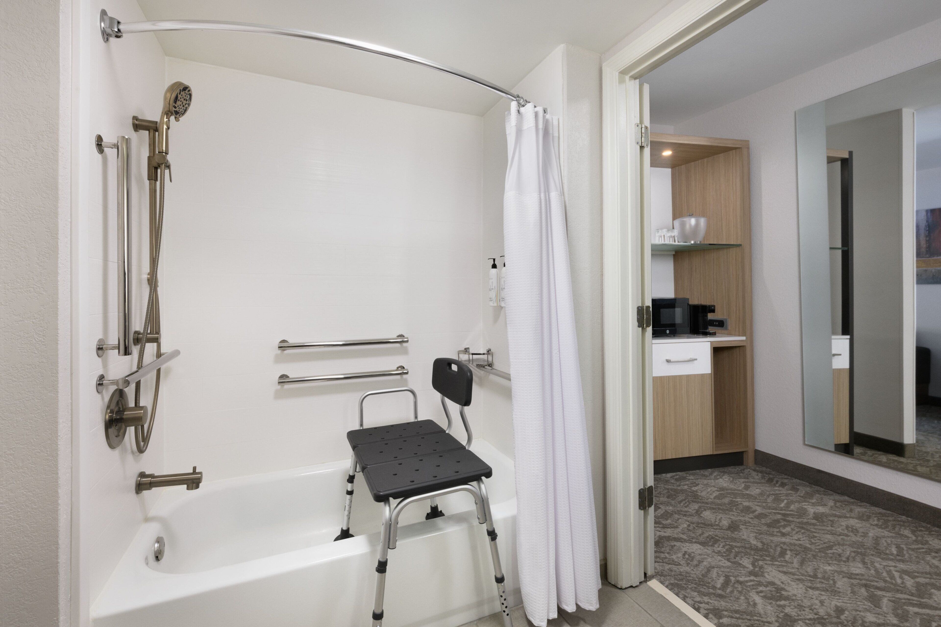 premium bedding, pillow-top beds, desk, laptop workspace