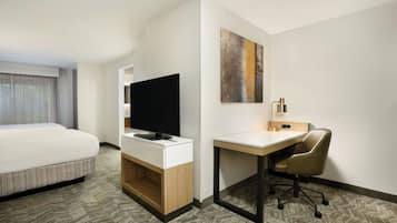 Premium bedding, pillow-top beds, desk, laptop workspace