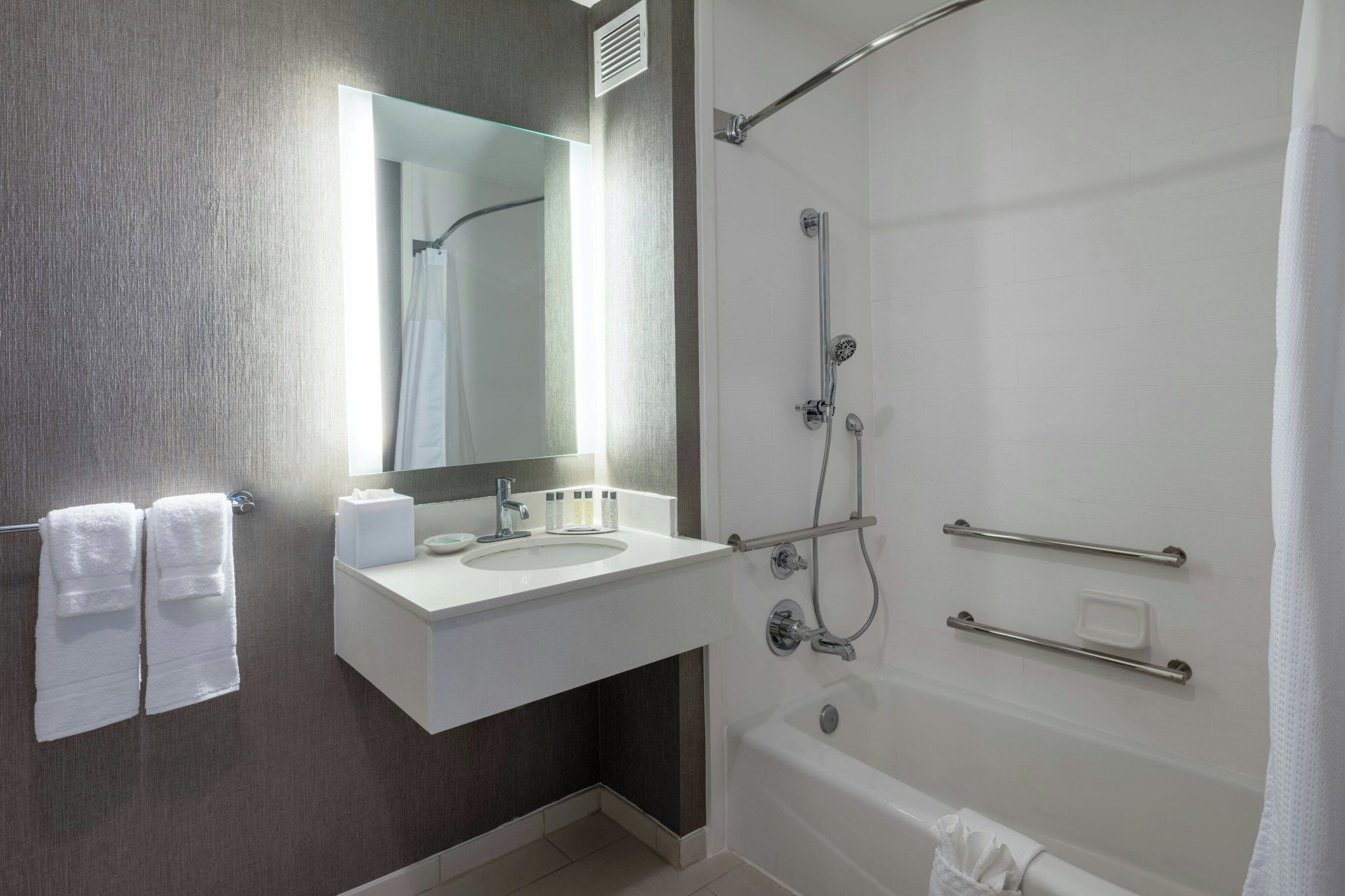 studio, multiple beds | bathroom | hair dryer, towels