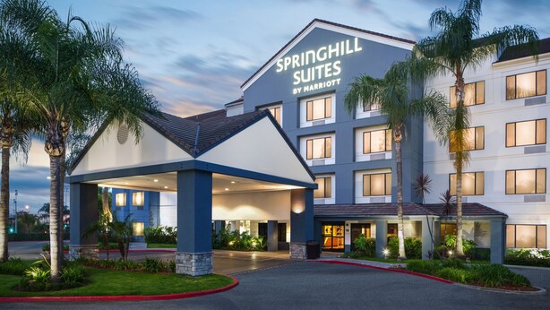 A hotel with a modern design, featuring a prominent sign for Springhill Suites by Marriott. - SpringHill Suites by Marriott Pasadena Arcadia (Arcadia)