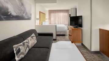 Premium bedding, pillowtop beds, desk, laptop workspace