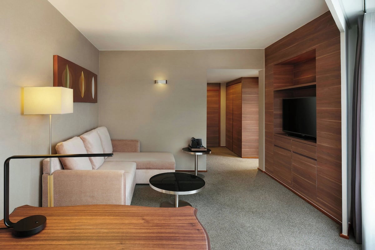 Executive Suite, 1 Bedroom | Living room | TV, pay movies