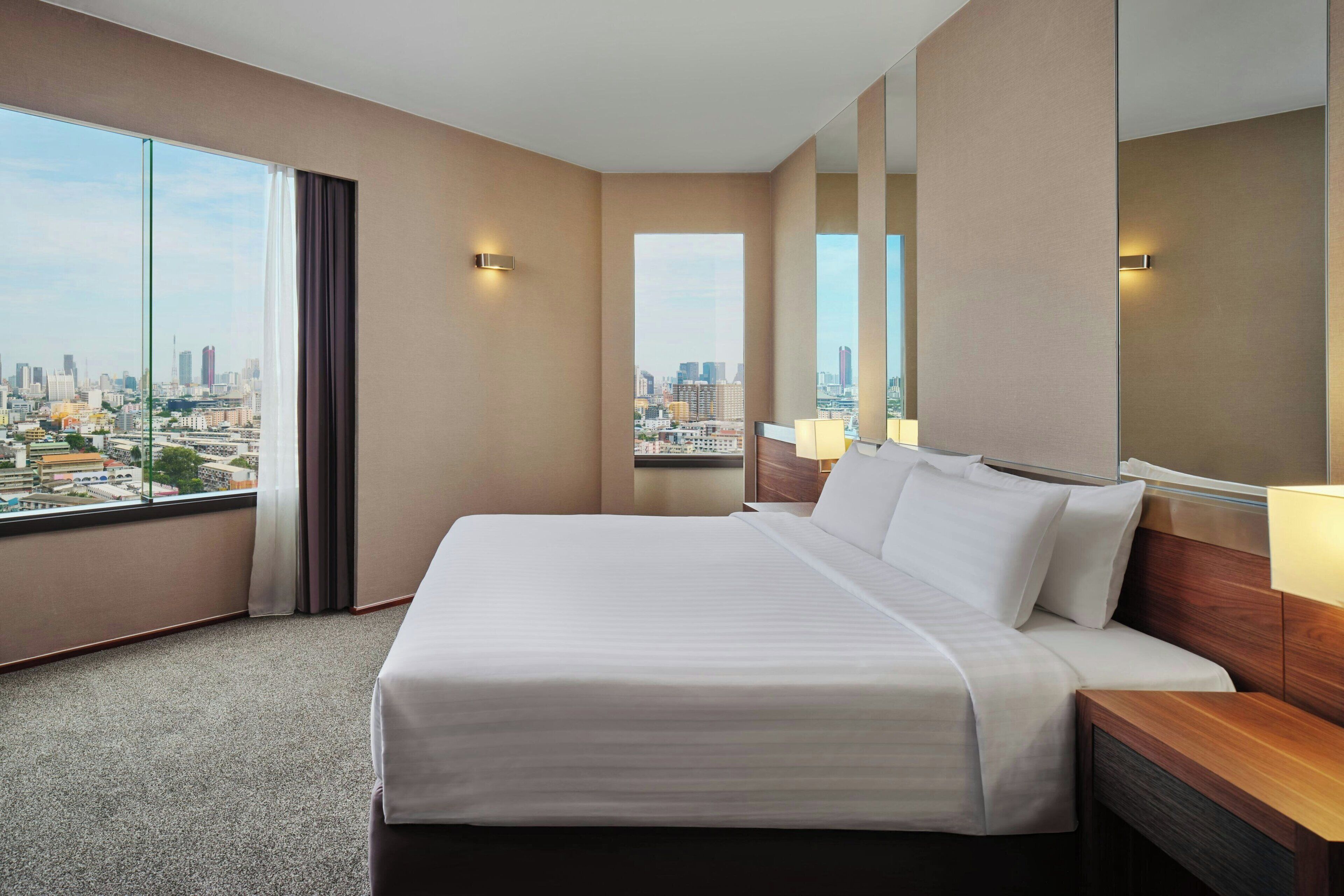 Suite ejecutiva, 1 habitación | Minibar, caja de seguridad en la habitación y escritorio 