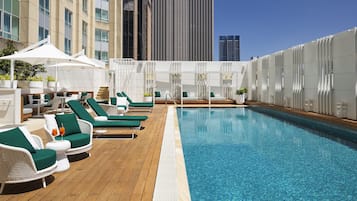 Outdoor pool, open 6:00 AM to 10:00 PM, free pool cabanas, pool loungers