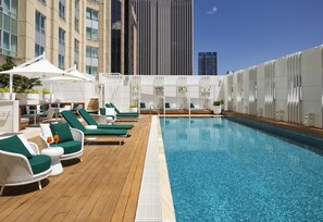 Outdoor pool, open 6:00 AM to 10:00 PM, free pool cabanas, pool loungers