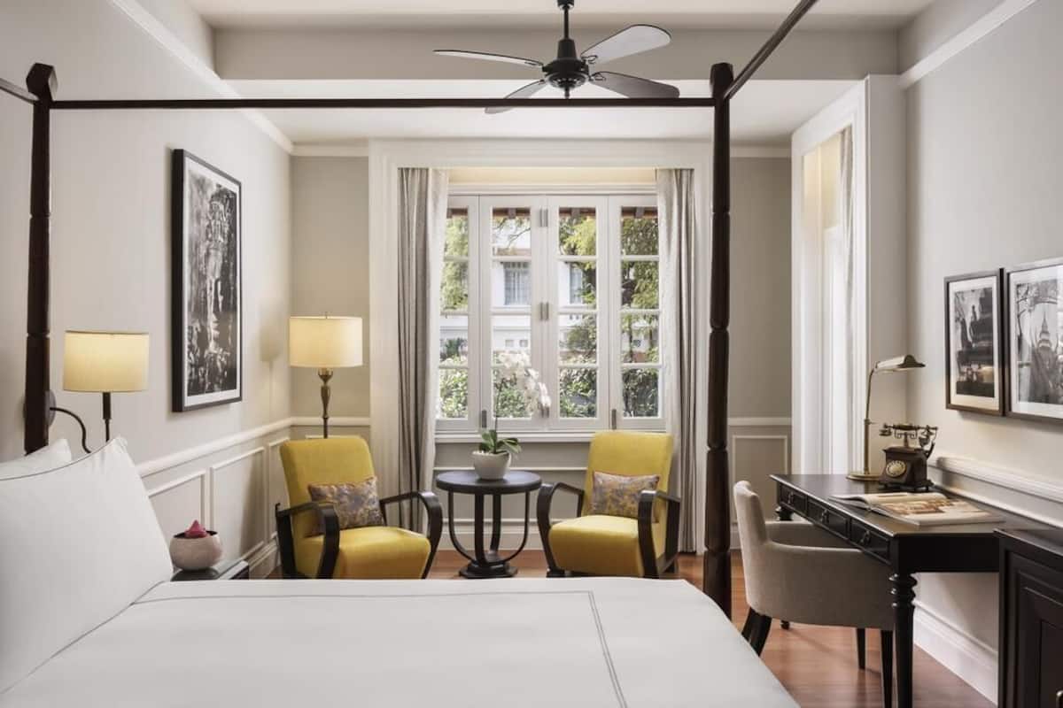 Suite, 1 King Bed, Balcony | Minibar, in-room safe, individually furnished, desk