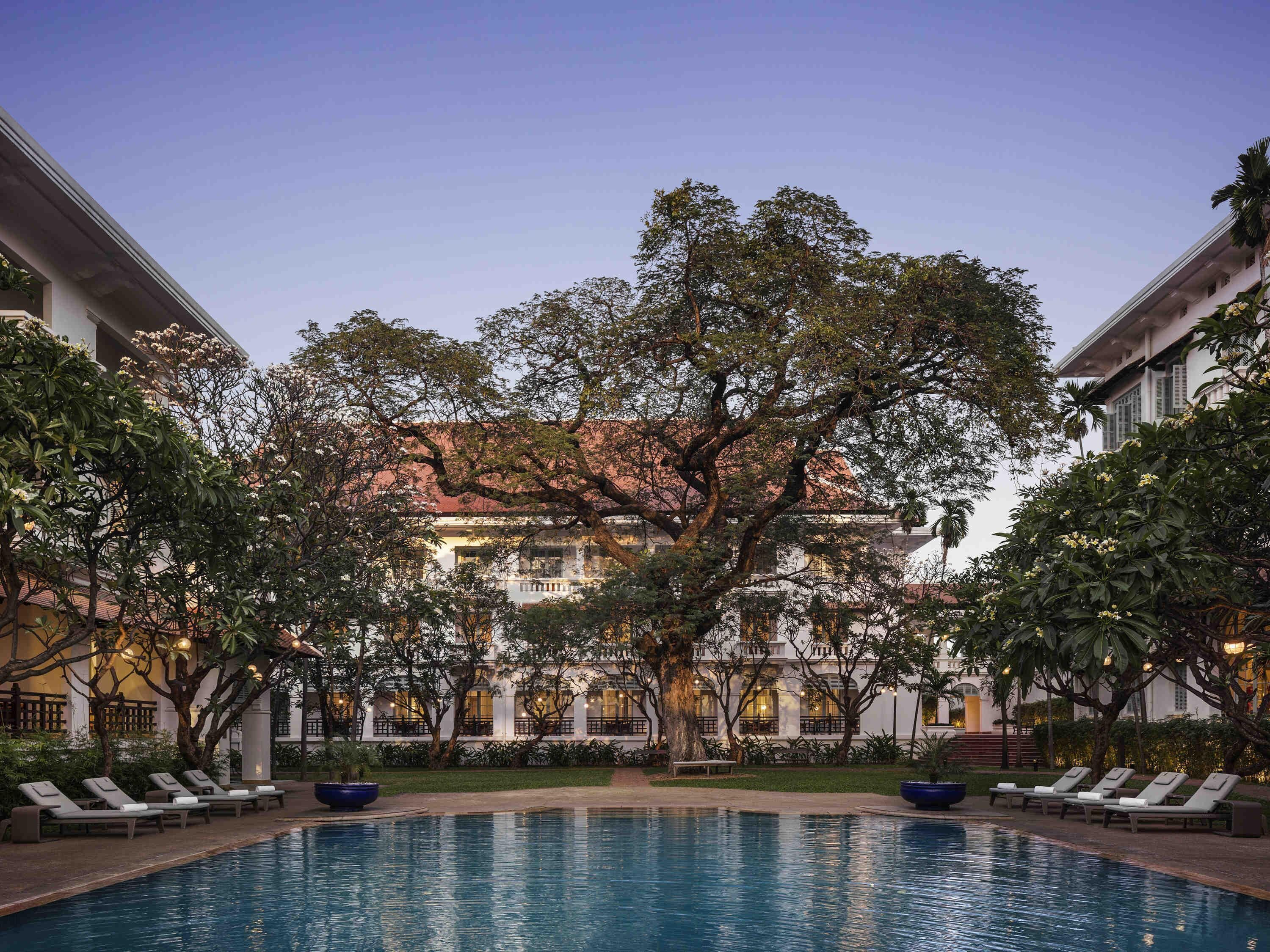 2 outdoor pools, open 6:00 AM to 8:00 PM, pool umbrellas