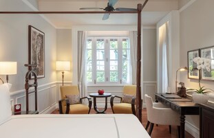 Suite, 1 King Bed, Balcony | Minibar, in-room safe, individually furnished, desk