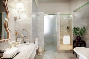 Separate bathtub and shower, rainfall showerhead, designer toiletries