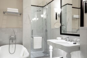 Separate bathtub and shower, rainfall showerhead, designer toiletries