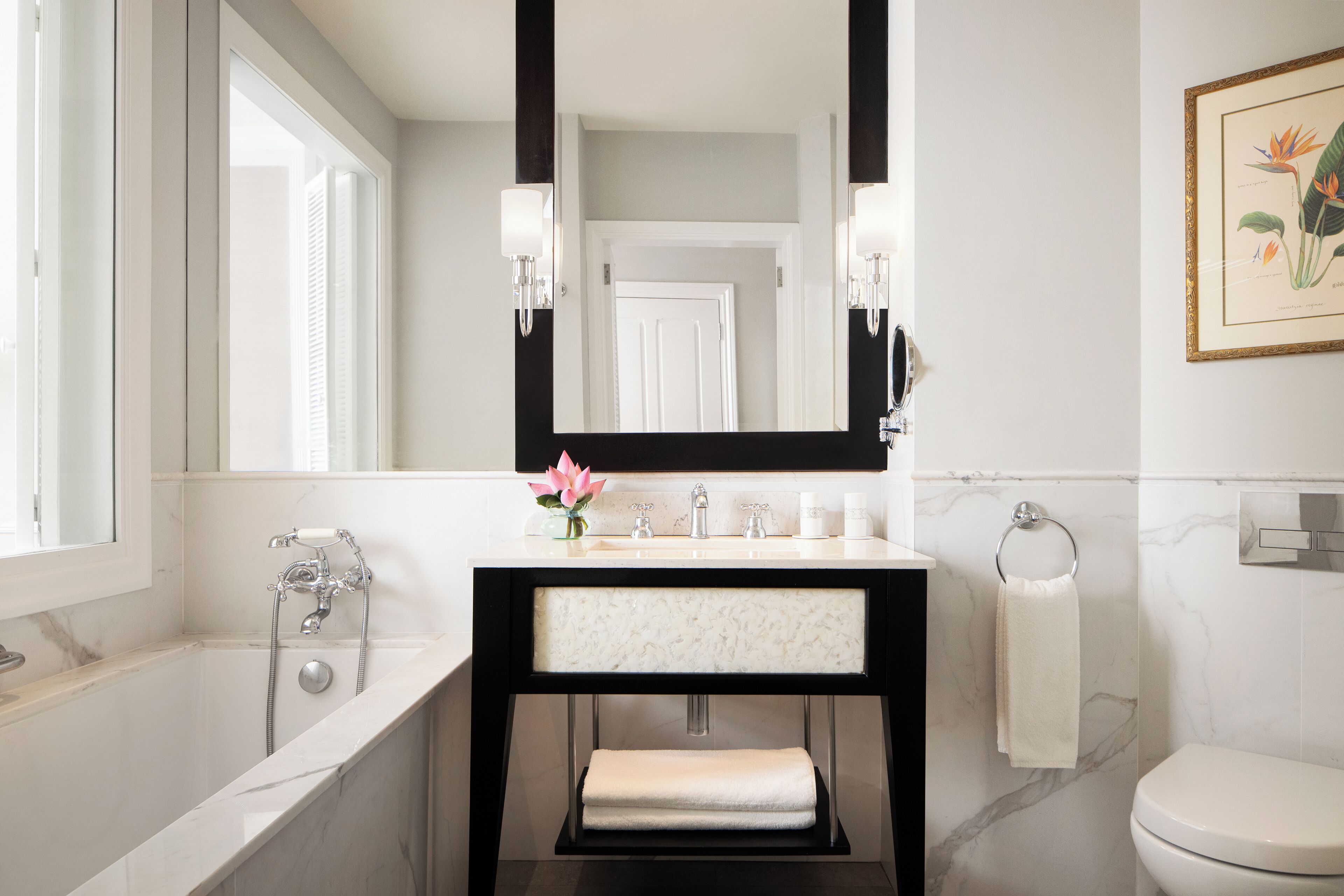 Separate tub and shower, rainfall showerhead, designer toiletries