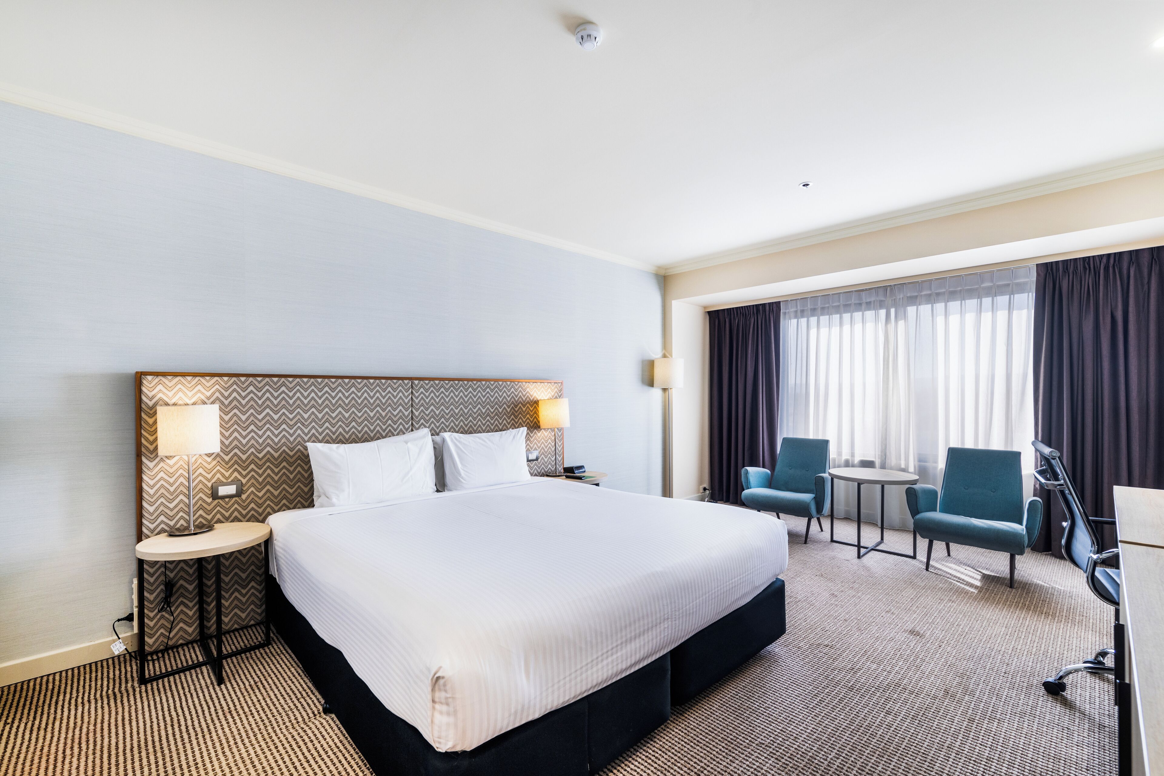 Habitación Grand, vista a la ciudad | Ropa de cama de alta calidad y minibar 
