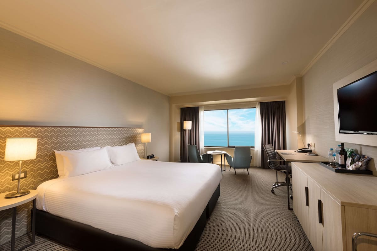 Habitación Grand, vista al océano | Ropa de cama de alta calidad y minibar