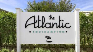 A sign for 'The Atlantic Southampton' with a stylized logo and text. - The Atlantic Hotel (Southampton)