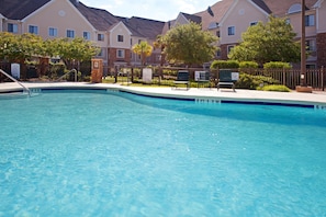Outdoor pool, open 8:00 AM to 10:00 PM, pool umbrellas, pool loungers