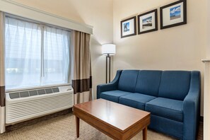 Suite, 1 King Bed, Non Smoking | Desk, laptop workspace, blackout drapes, soundproofing