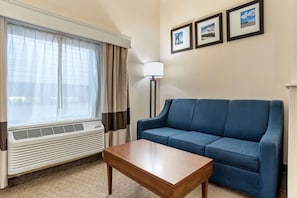 Suite, 1 King Bed, Non Smoking | Desk, laptop workspace, blackout drapes, soundproofing