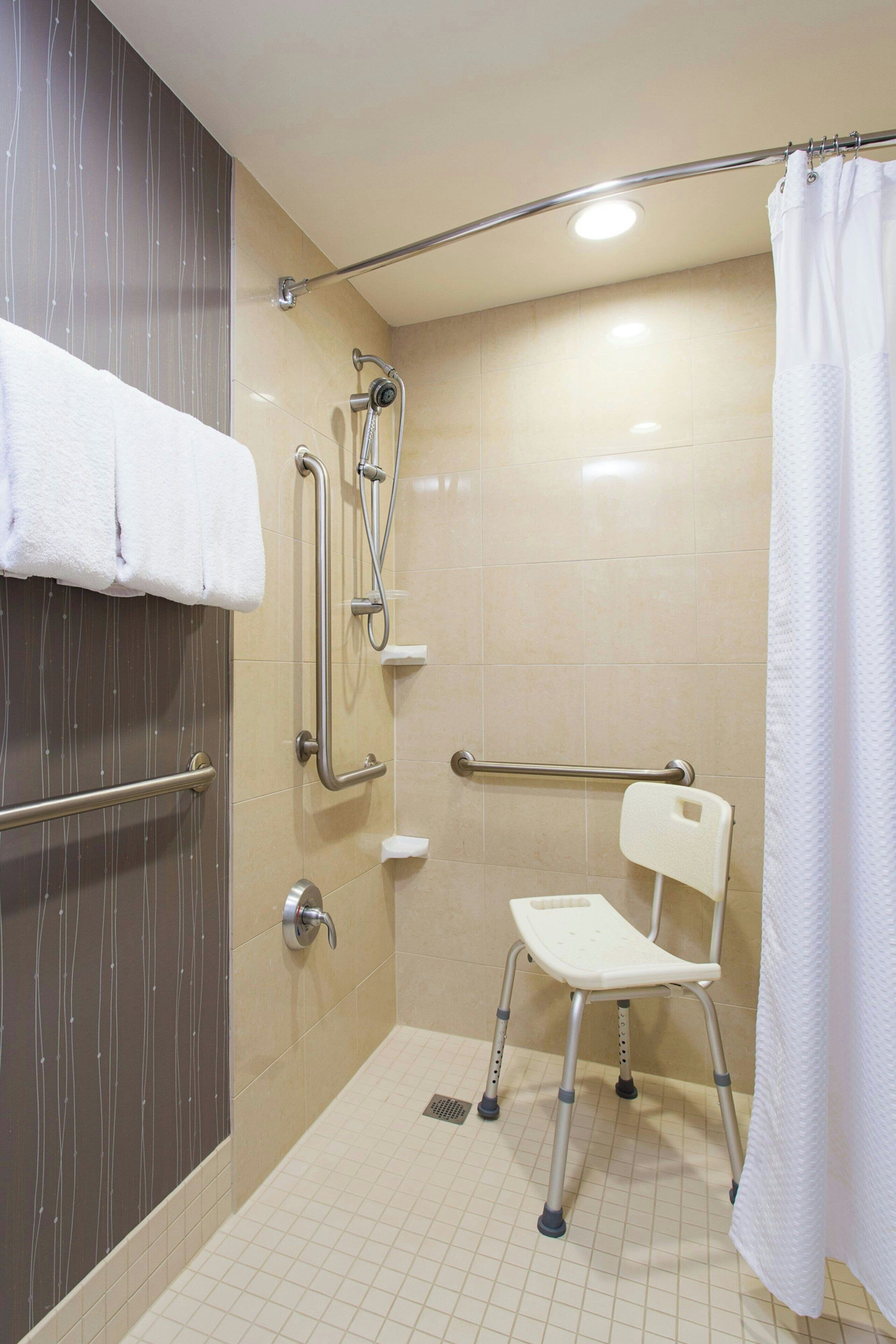 combined shower/bathtub, free toiletries, hair dryer, towels