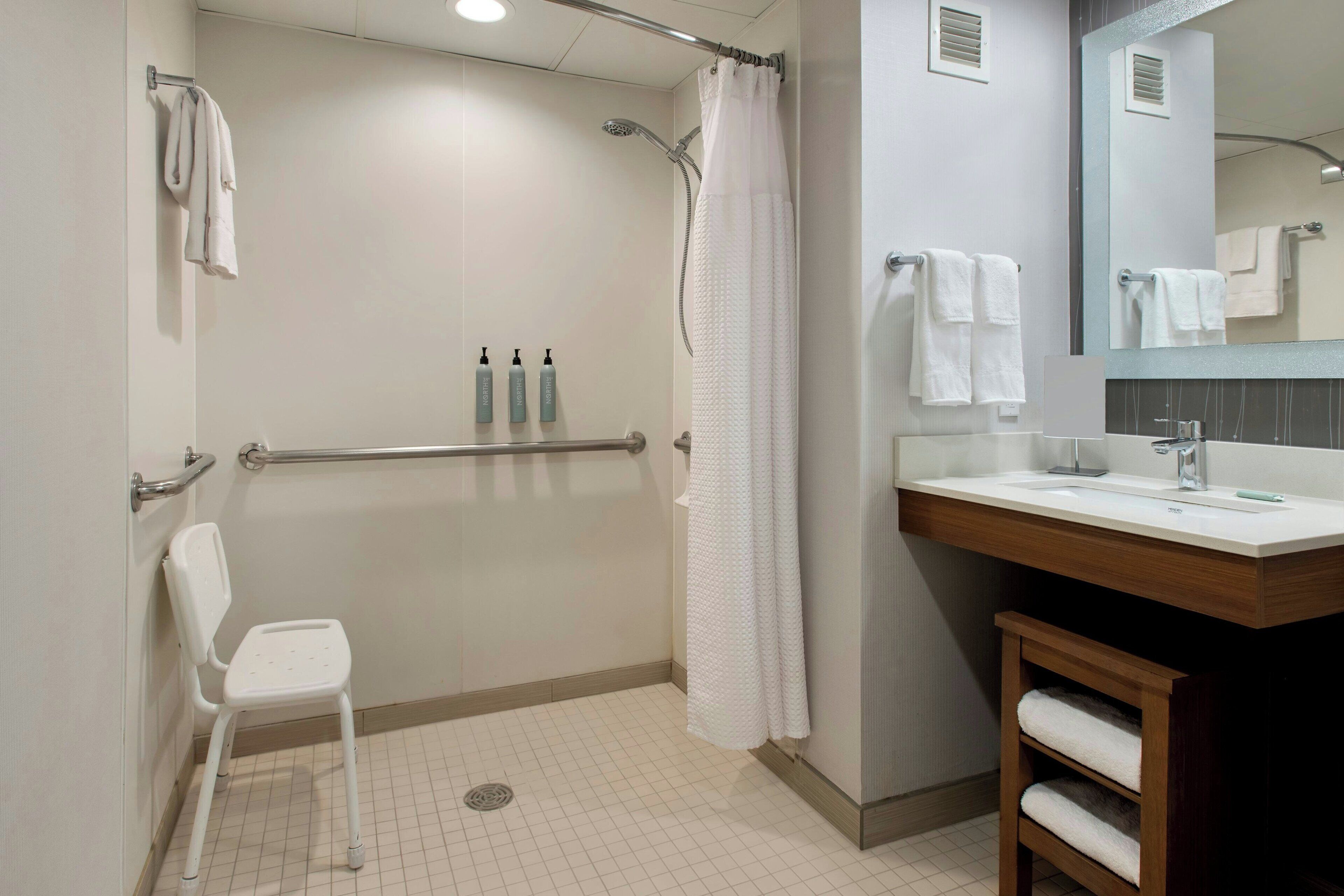 combined shower/bathtub, free toiletries, hair dryer, towels