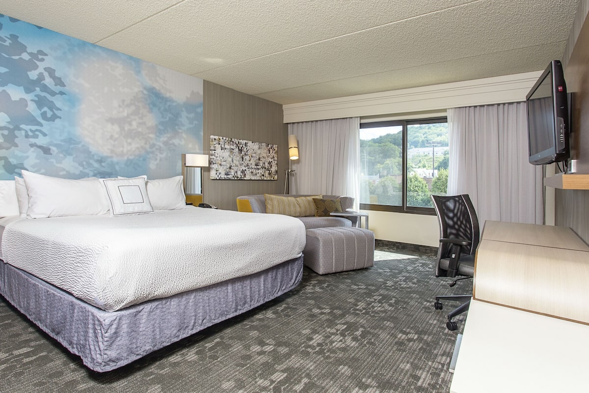 Down comforters, desk, blackout drapes, iron/ironing board